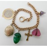 A 9ct gold charm bracelet with three carved gemstone charms and other items, length 19cm, weight