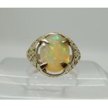 A 9ct gold gents ring set with a jelly opal, size V, weight 3.6gms Condition Report: Available