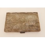 A white metal box engraved with a scene of a rural church, 9cm x 6cm Condition Report: Available