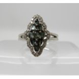 An 18ct white gold alexandrite and diamond ring, set with estimated approx 0.17cts of diamonds and