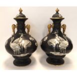 A pair of T. Forester Ltd Phoenix Ware 'Cairo' pattern jars and covers, 34.5cm high (2) Condition