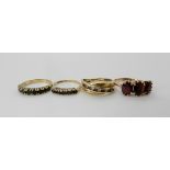 A 9ct gold cz and red gem ring, size M, a 9ct gold three stone garnet ring O1/2, a 9ct gold
