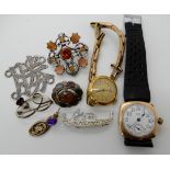 A gold plated Elgin wristwatch, a Scottish agate brooch, a silver thistle brooch etc Condition