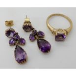 A 9ct gold amethyst ring, size N1/2 and a pair of yellow metal drop earrings length 3.1cm,