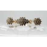 A 9ct gold diamond cluster ring and matching earrings, weight 5.6gms Condition Report: Available