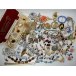 A collection vintage costume jewellery to include a pink gem sand flower necklace, toucan brooch and