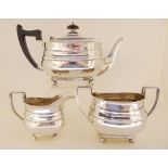A bachelors three piece silver tea service by William Hutton & Sons Limited, Sheffield 1938, of