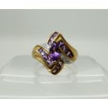 A 9ct amethyst and diamond dress ring, size P1/2, weight 4gms Condition Report: Available upon