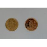 A cased set of two gold full sovereigns, 1865 and 2002 Condition Report: Available upon request