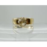 An 18ct gold Glasgow hallmarked ring set with a clear gem, size M, weight 3.3gms Condition Report:
