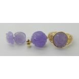 A 14ct gold ring set with a carved lilac jade size O1/2, a 14k mounted lilac jade Chinese symbol