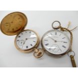 A silver Waltham pocket watch and a gold plated example Condition Report: Not available for this
