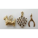 A 9ct gold heart shaped pendant set with pearls 2.7cm, a bright yellow metal Scotty dog charm and