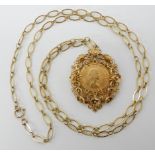 *WITHDRAWN* A 1962 full gold sovereign in a fancy 9ct gold flower pendant mount, with 9ct open