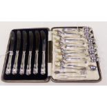 A lot comprising a cased set of six silver handled butter knives, Sheffield 1946, with thirteen