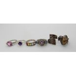 Two early Ola Gorie rings and four other silver gem set rings Condition Report: Not available for