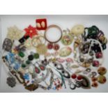 A collection of vintage costume jewellery to include, Corocraft, buckles etc Condition Report: Not