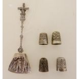 A lot comprising a Dutch silver caddy spoon marked 90 with figural embossed scoop and windmill