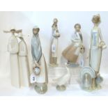 Three Lladro figure groups to include pair of nuns, 33.5cm high, woman with two turkeys and woman