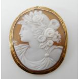 A large 9ct gold mounted shell cameo of a maiden, 5.2cm x 4.5gms Condition Report: Available upon