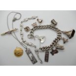 An extensive silver charm bracelet, silver mackintosh style items, a Greenock gold plated