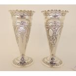 A pair of silver vases, unclear maker's marks, London 1901, of trumpet form with flaring rim with
