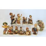 A Hummel wall pocket, no. 360A, 15cm high, eight Hummel figures including Little Goat Herder, Boots,