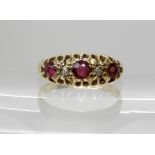 An 18ct gold ruby and diamond ring dated Chester 1916, size N, weight 2.6gms Condition Report: