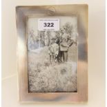 A silver mounted photo frame, rubbed marks, 17.2cm x 12.7cm, aperture 13.2cm x 8.8cm Condition