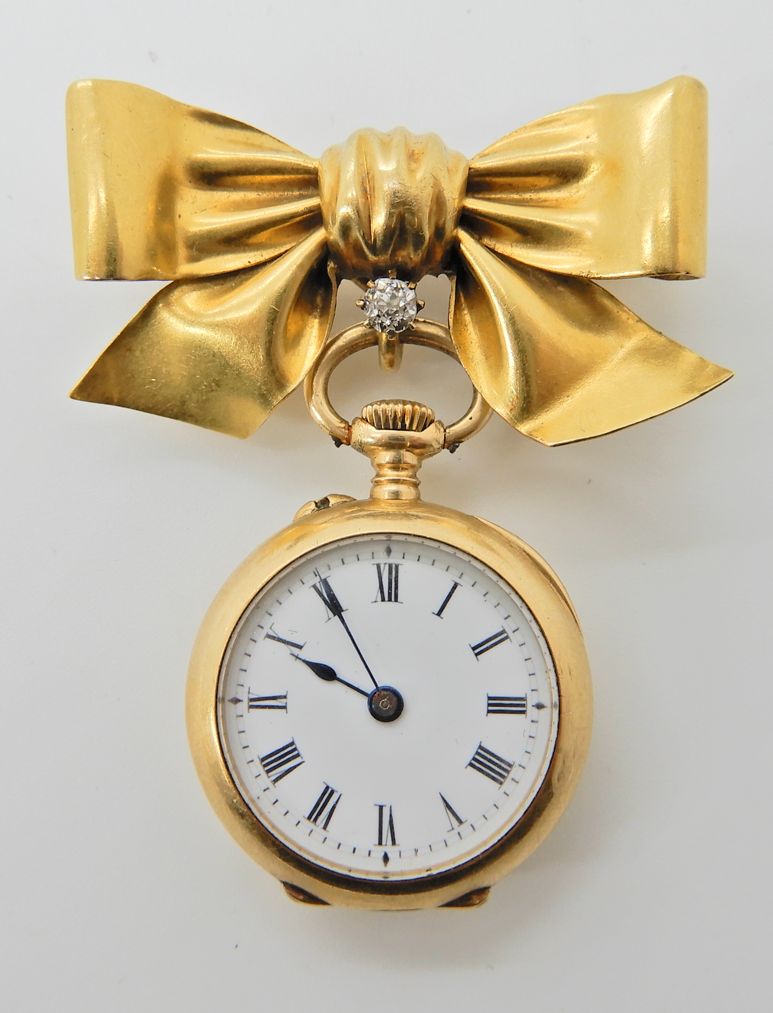 A gold plated Le Roy & Fils fob watch with an 18ct bow fob brooch, diameter of the pendant watch