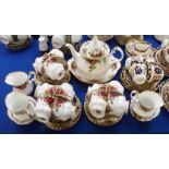 A Royal Albert Old Country Roses teaset comprising teapot, eleven cups, twelve saucers and plates,