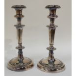 A pair of silver plated candlesticks (2), 26cm high Condition Report: Available upon request