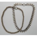 Two Victorian white metal locket chains Condition Report: Not available for this lot