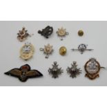 A lot comprising assorted military badges and an RAF patch Condition Report: Available upon request