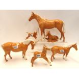 Six Beswick Palominos including stallion, two mares and three foals Condition Report: smaller mare