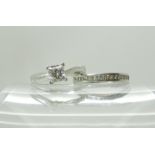 A platinum princess cut diamond ring of estimated approx 0.50cts, finger size J1/2, together with