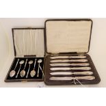 A cased set of six silver and floral enamel coffee spoons, Birmingham 1938, with a cased set of