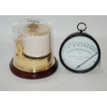 A Negretti & Zambra Relative Percentage Humidity gauge, 10cm diameter and a Sewills circular