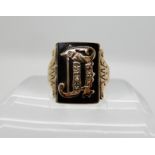 A 9ct gold Onyx and rose cut diamond monogrammed ring, size V, weight 6.8gms Condition Report: