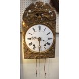 A 19th century French market wall clock with twin chain movement, the relief pressed brass face with