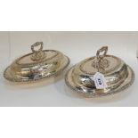 A pair of silver plated entree dishes and covers with engraved decoration (2) Condition Report: