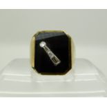 A 14ct gold onyx and diamond set gents ring size W1/2, weight 13.4gms Condition Report: Available