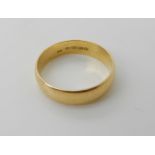 An 18ct gold wedding ring, size V1/2, weight 5.3gms Condition Report: Available upon request
