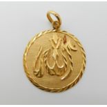 A 21k gold Arabic script pendant weight 3.1gms Condition Report: Available upon request