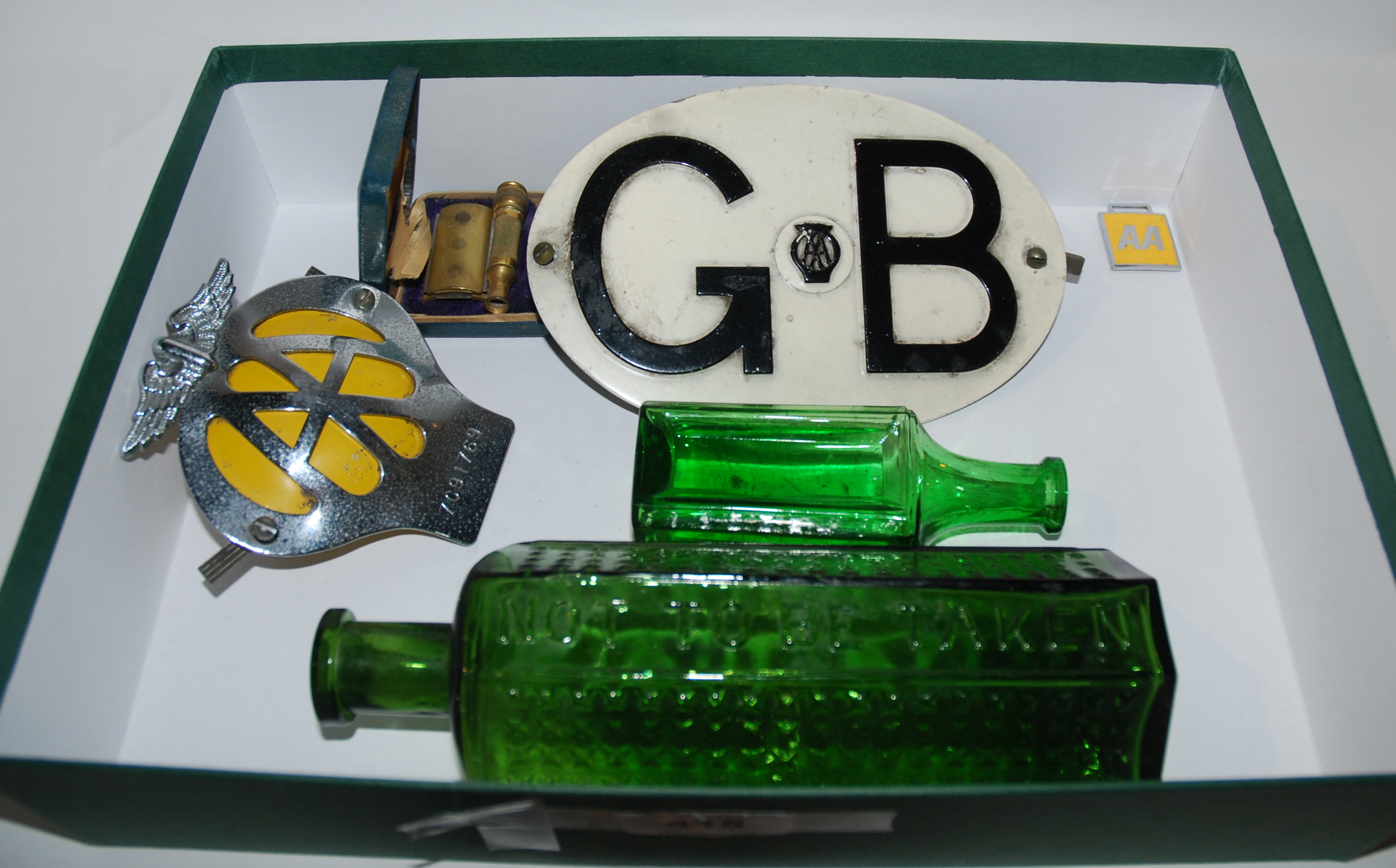 Two AA car mascots, green glass bottles etc Condition Report: Available upon request
