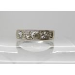 An 18ct white gold five stone diamond ring, set with estimated approx 0.40cts, finger size P, weight