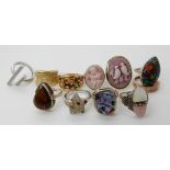 A collection of silver and white metal rings to include; cameo rings, gem set, dichroic glass etc