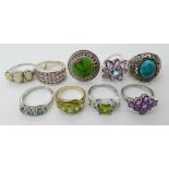 A collection of silver and white metal rings to include, amethyst, peridot etc Condition Report: Not