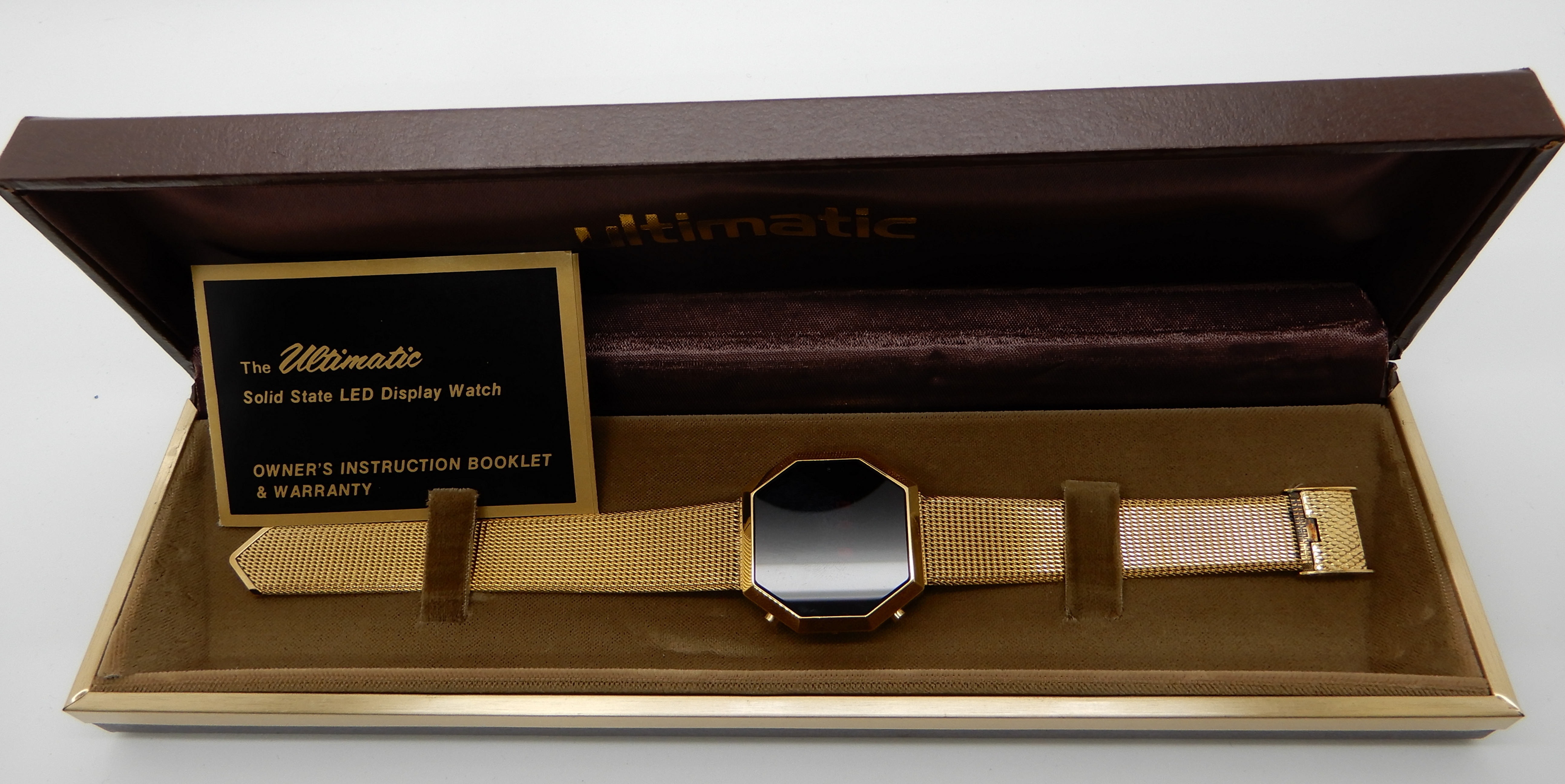 A gents retro gold plated Ultimatic, Solid State LED display watch, with original box Condition