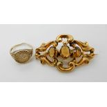 A bright yellow metal citrine set Victorian brooch, 4.5cm x 3cm, a 9ct gold faux coin ring, weight